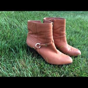Women’s heeled brown leather booties size 9